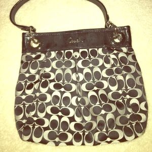 Women’s black and grey coach purse
